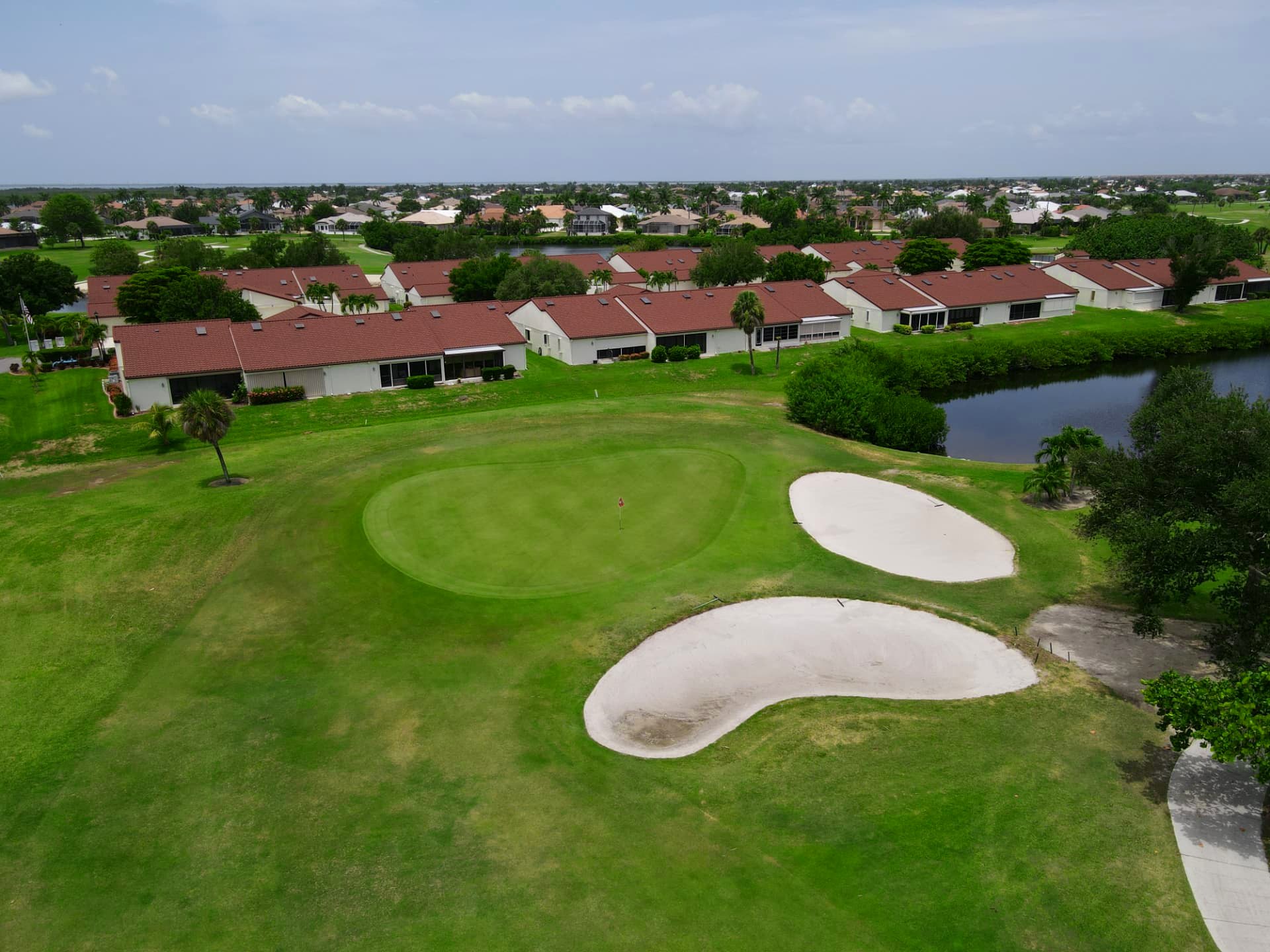 Green and bunker complex beside the club's villas